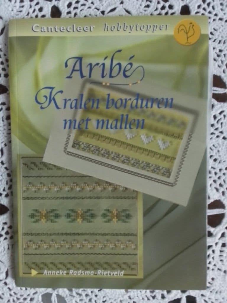 Boek "Aribé, Kralen borduren met mallen" NIEUW, Ophalen of Verzenden, Zo goed als nieuw, Handborduren, Patroon