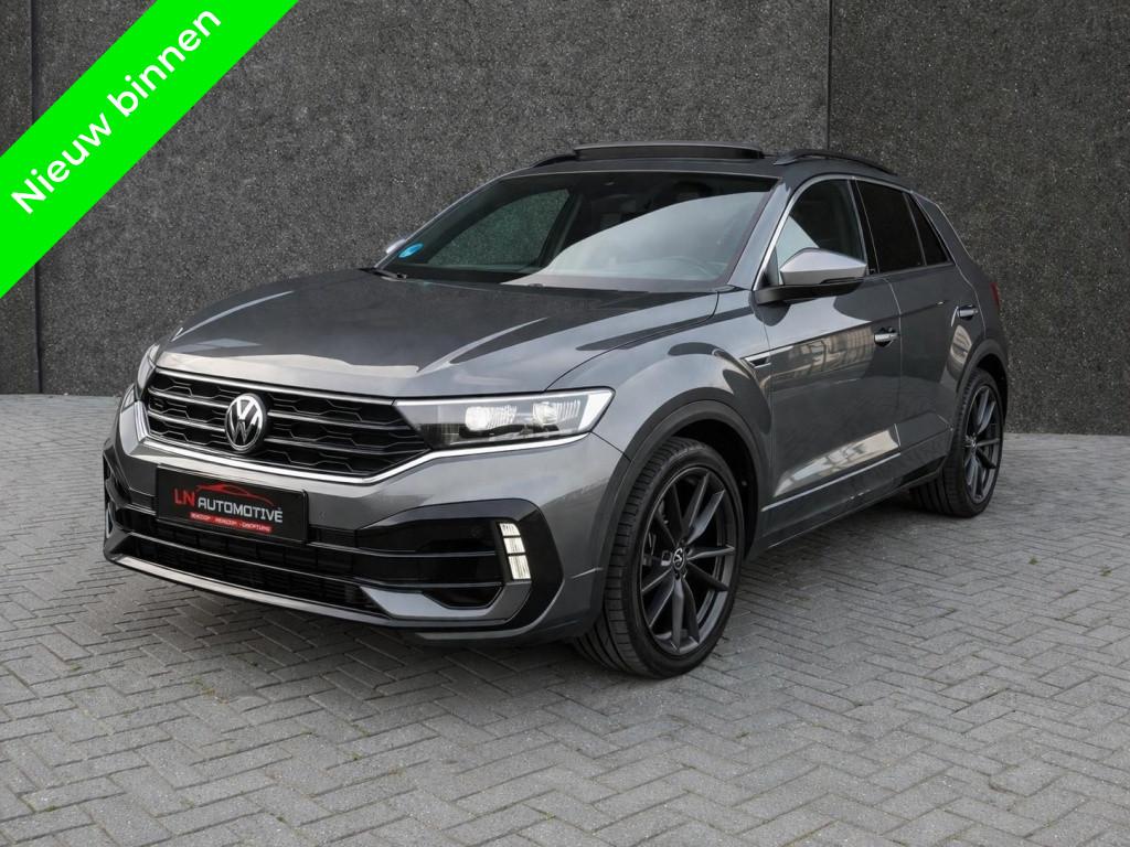 Volkswagen T-Roc 2.0 TSI 4Motion R AKRA (bj 2022, automaat), Auto's, Gebruikt, Euro 6, 4 cilinders, 1984 cc