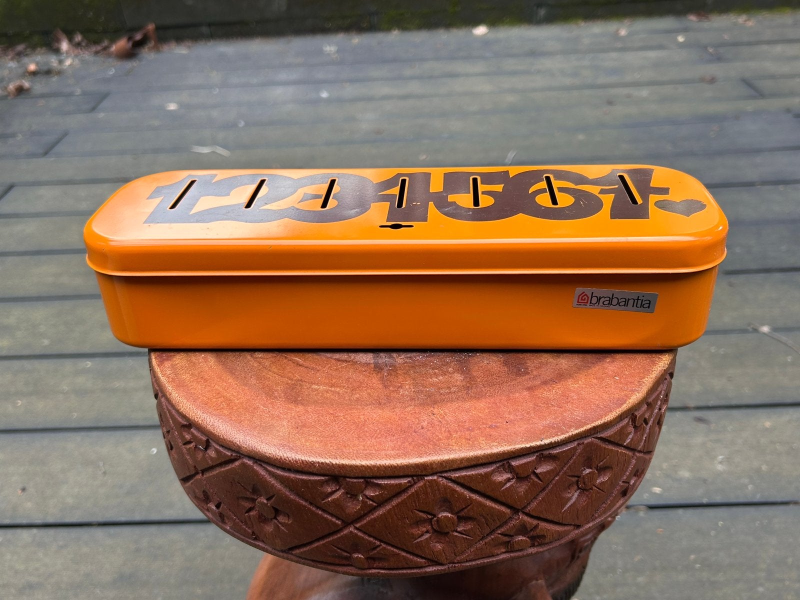 Vintage Brabantia spaarpot '100000' oranje, Ophalen of Verzenden, Gebruikt, Metaal of Blik, Overige thema's