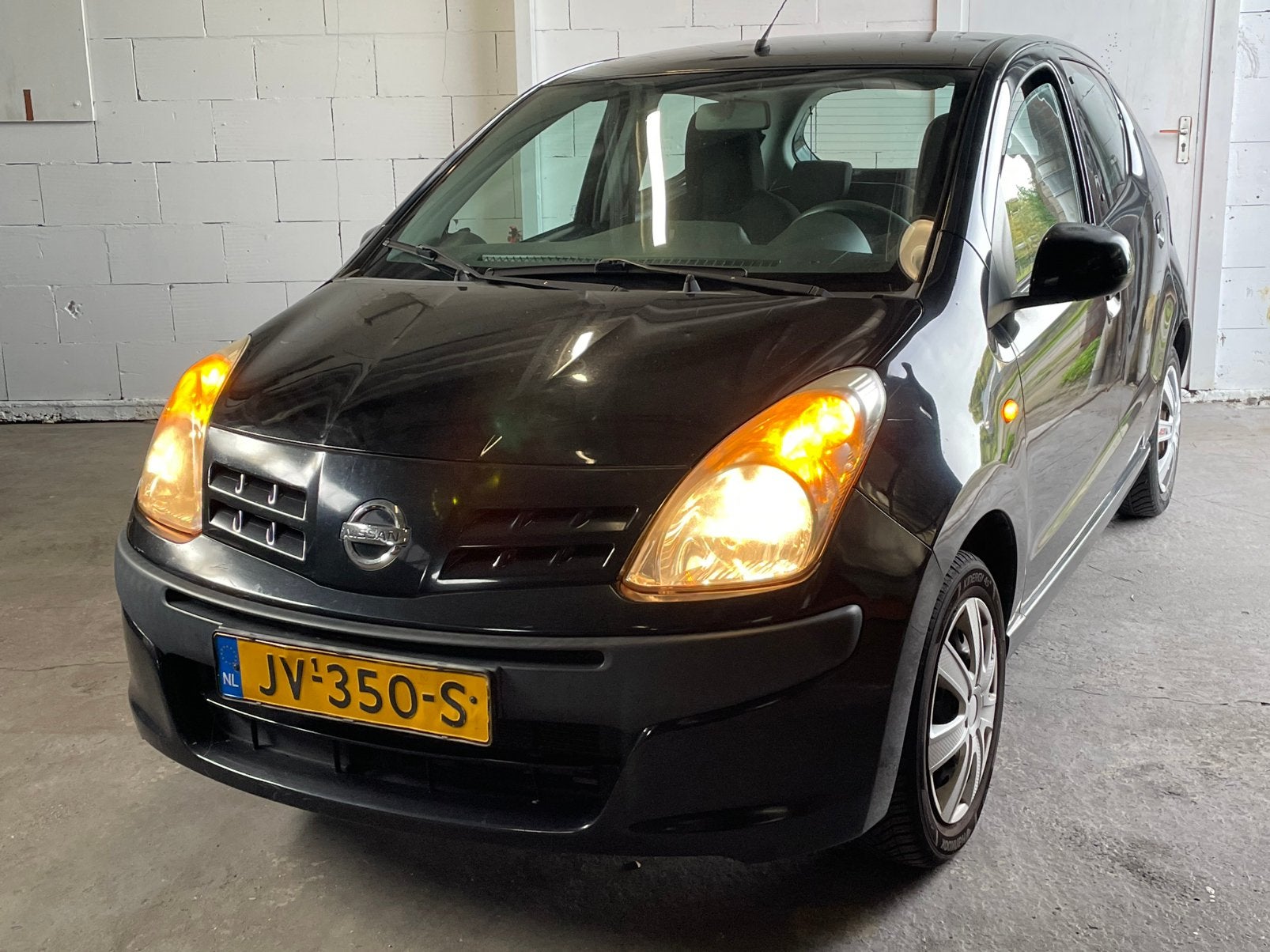 Nissan Pixo 1.0 5drs 2011 Zwart • Airco • Meeneemprijsje .., Auto's, Voorwielaandrijving, 200 kg, 4 stoelen, Bedrijf