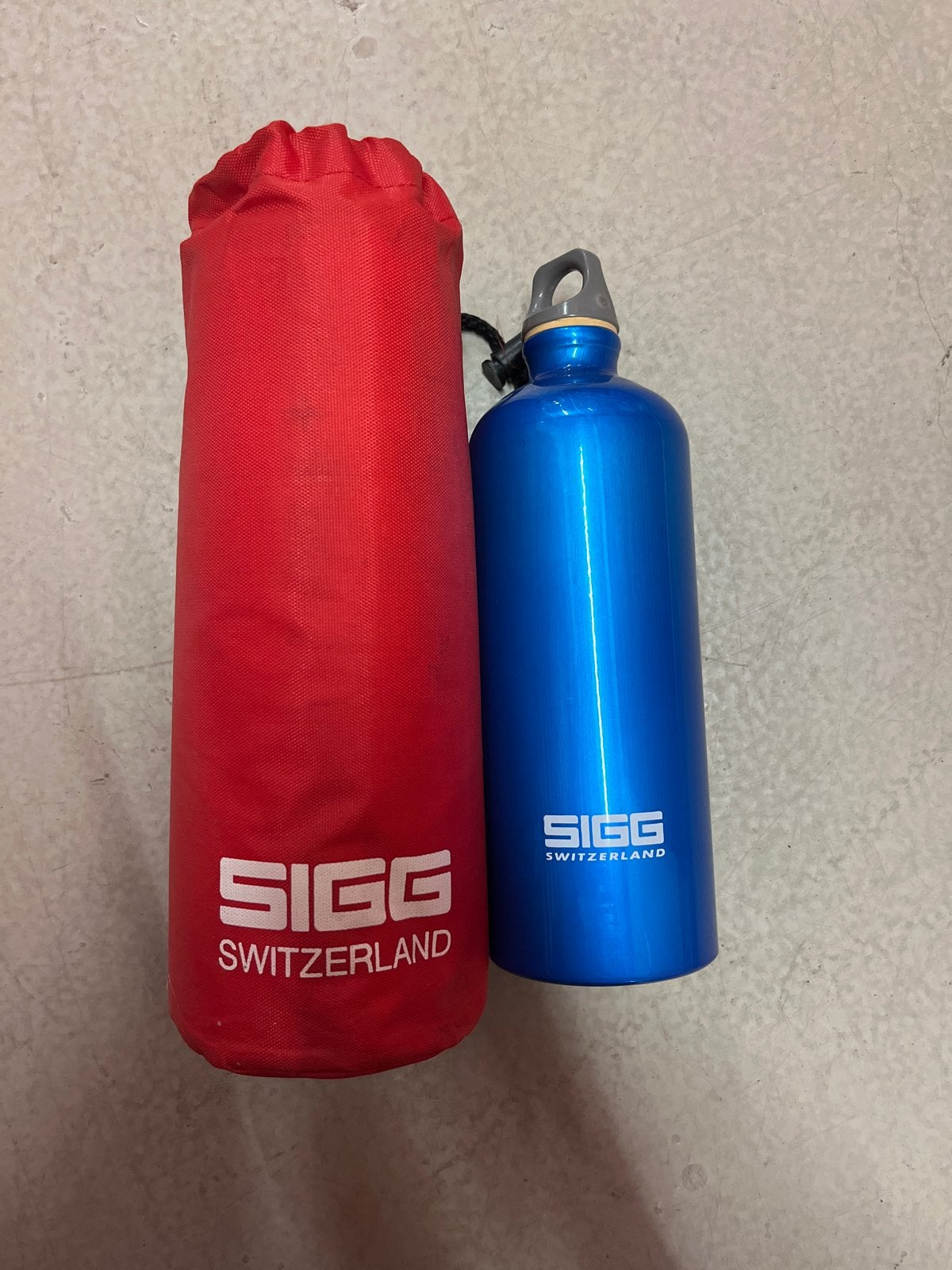 Sigg drinkfles met hoes - blauw, Ophalen of Verzenden, Gebruikt