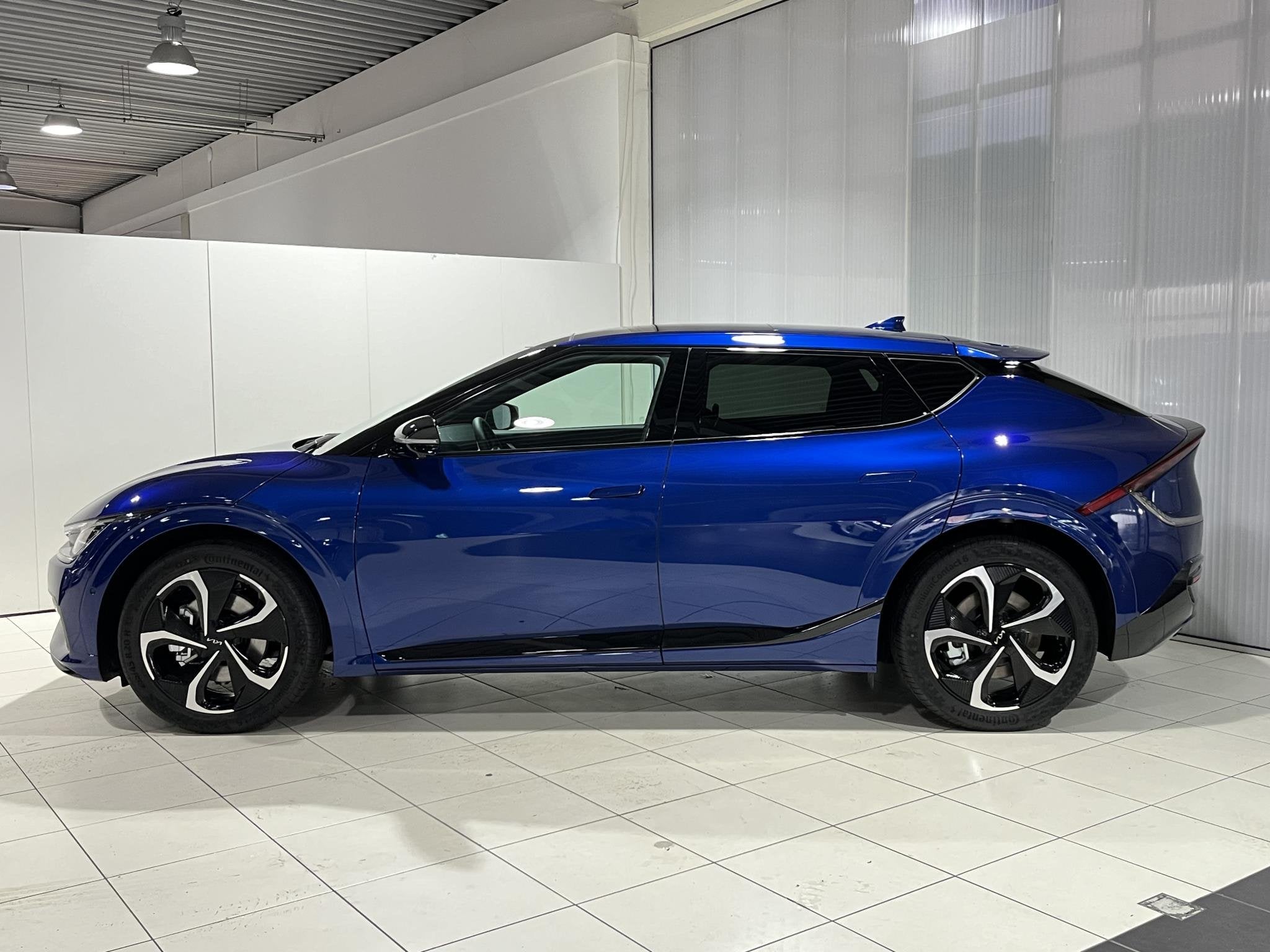 Kia EV6 GT-Line AWD 77.4 kWh 325PK, 360° Camera, Stoel en S, Auto's, Automaat, Gebruikt, Blauw, Origineel Nederlands