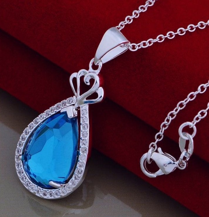 Mooie 925 zilveren kettinghanger met licht blauwe zirkoon, Overige voorstellingen, Nieuw, Ophalen of Verzenden, Met edelsteen