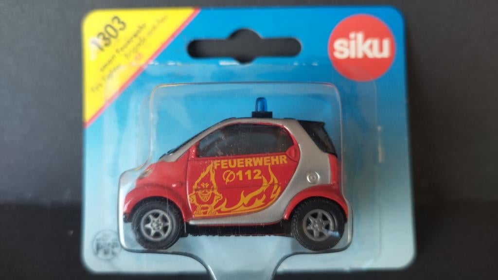 Smart City Coupe Feuerwehr 1:55 Siku 1303 Pol, Hobby en Vrije tijd, Modelauto's | Overige schalen, Schlittenbacherstrasse 60 Lüdenscheid Germany