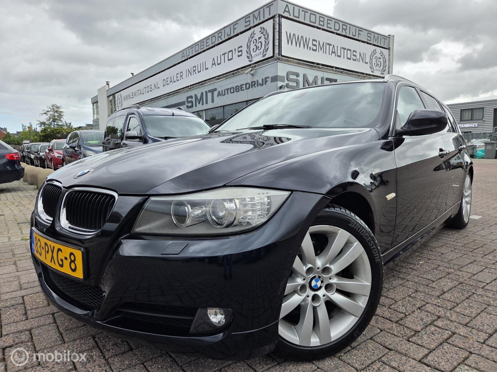 BMW 3-serie Touring 318i Corporate Lease Business Line Sport, Auto's, Euro 5, Zwart, 4 cilinders, Zwart