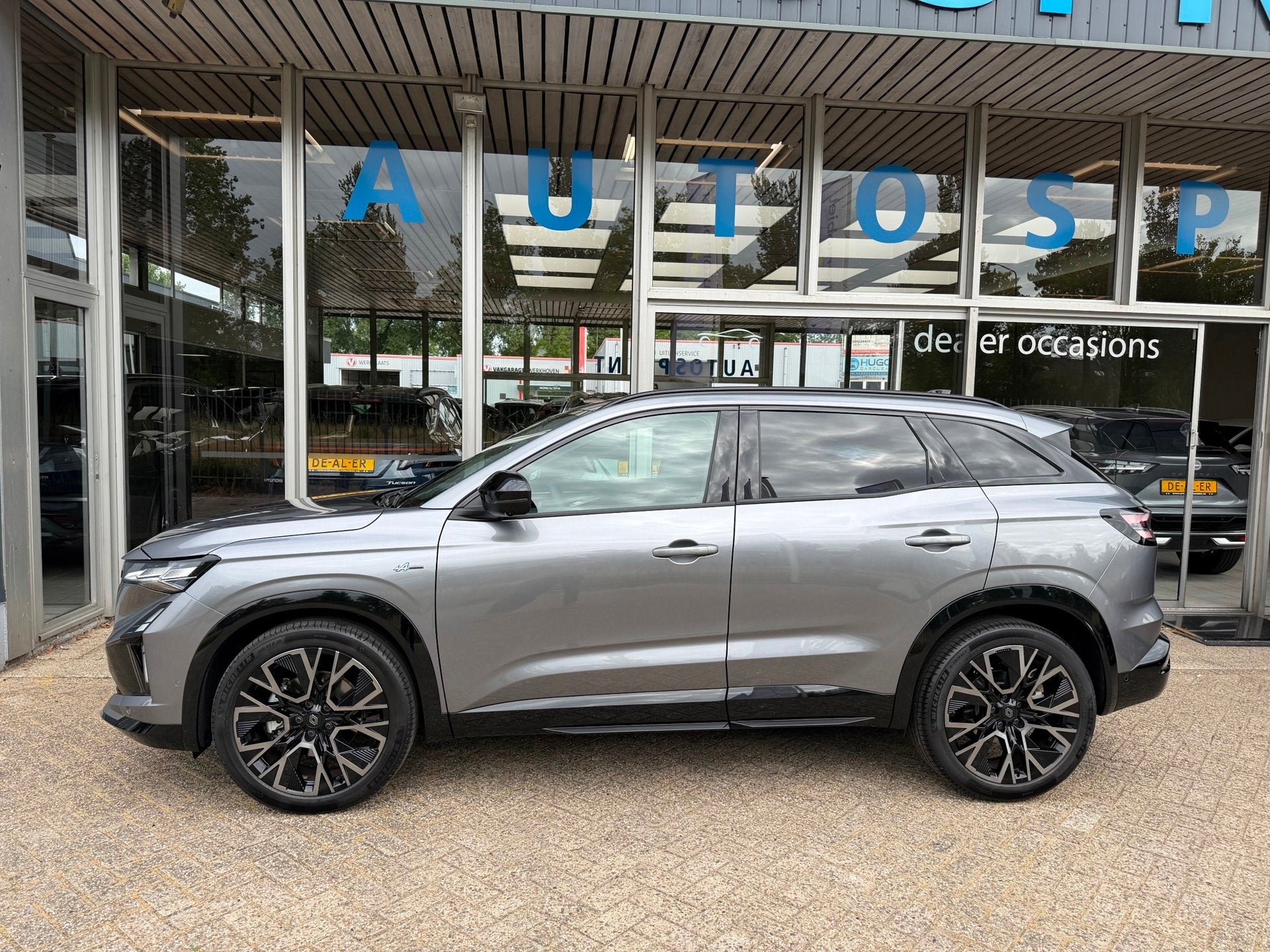 Renault Austral 1.2 E-Tech full hybrid 200 esprit Alpine NAV, Auto's, Gebruikt, Zwart, 1199 cc, Leder en Stof
