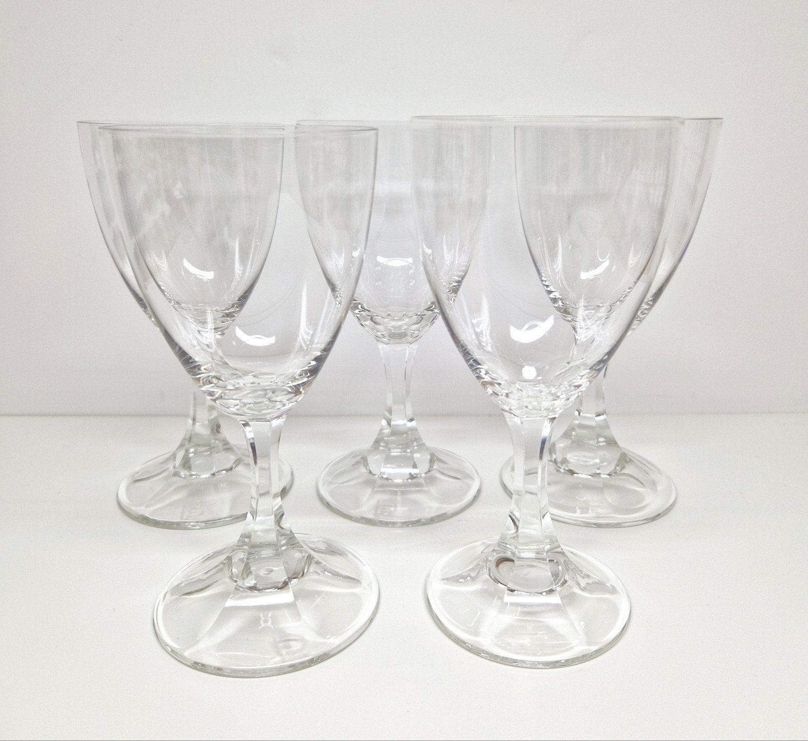 A.D. Copier Leerdam vijf heldere wijnglazen serie N.M. 1926, Antiek en Kunst, Antiek | Glas en Kristal, Ophalen of Verzenden