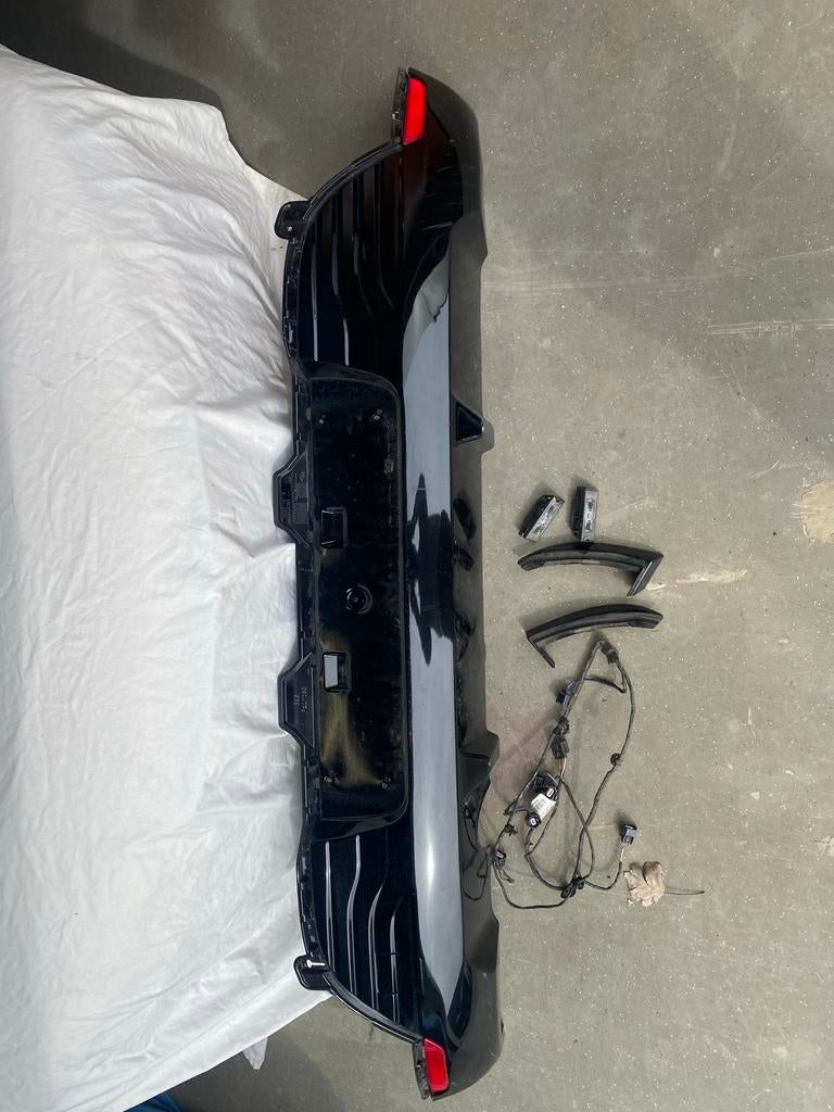Achterbumperdeel Renault Clio 2013 zwart met losse delen, Gebruikt, Renault, Ophalen of Verzenden, Achter