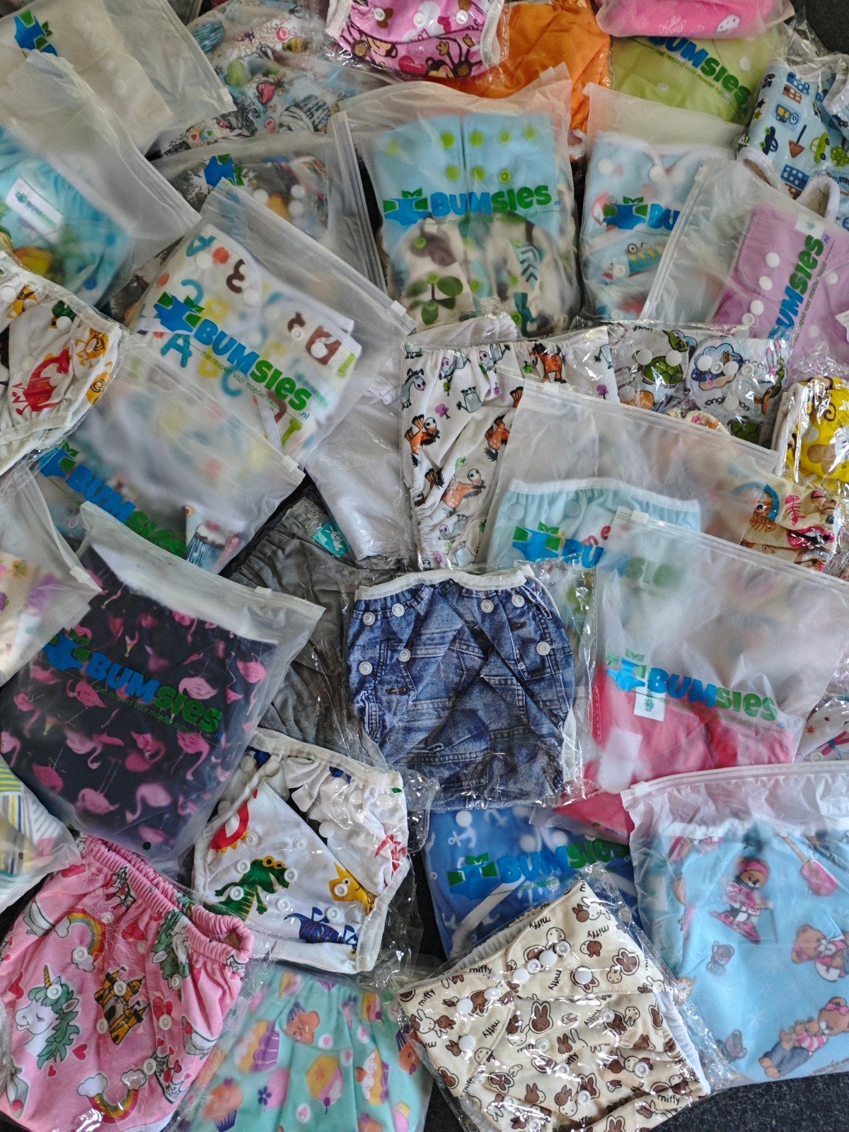 40 wasbare luiers en oefen broekjes in 1 koop alles nieuw, Ophalen of Verzenden