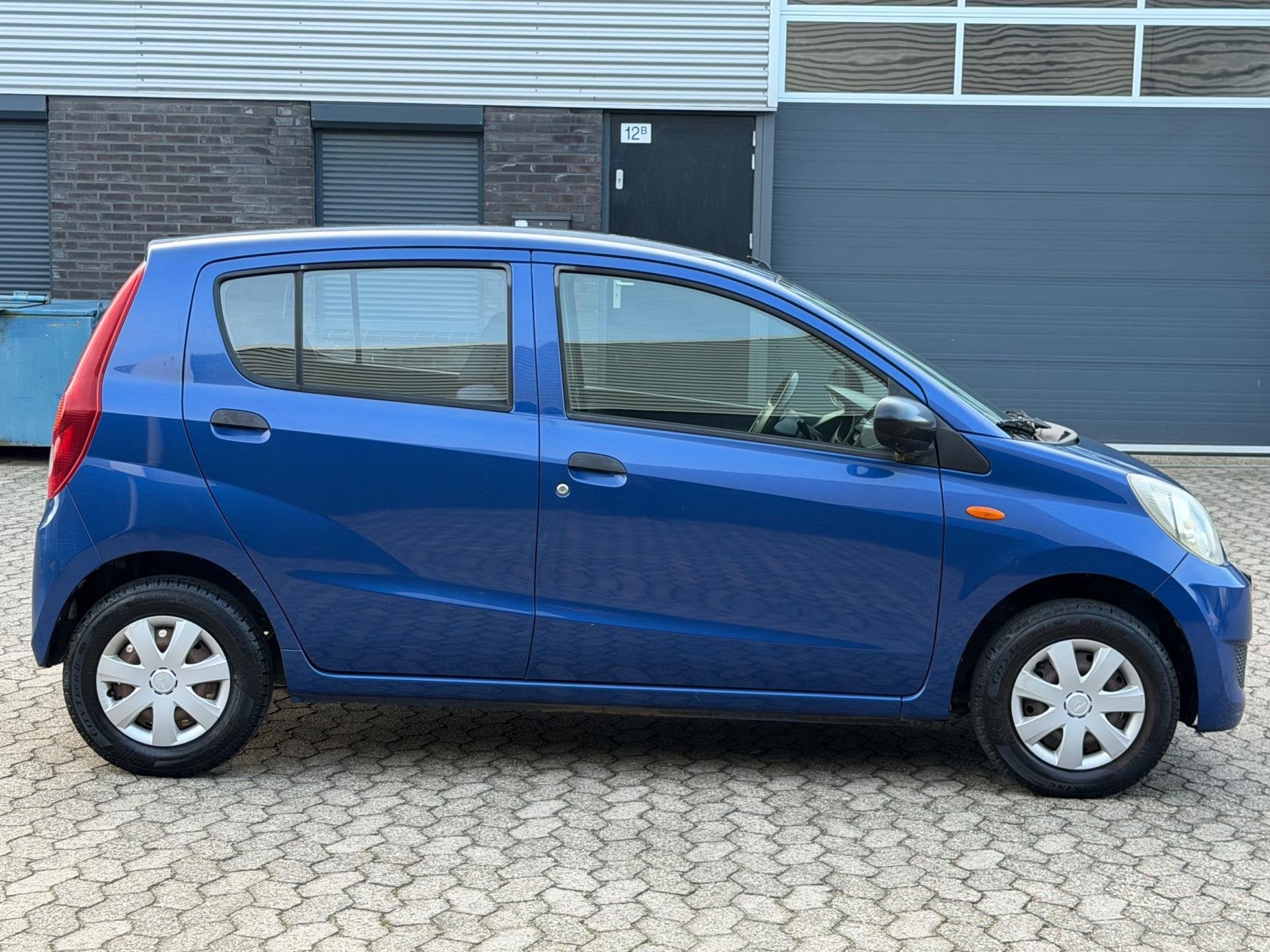 Daihatsu Cuore 1.0 Trend APK 04-2027 5deurs STUURBEKRACHTING, Auto's, Voorwielaandrijving, Stof, Zwart, 18 €/maand
