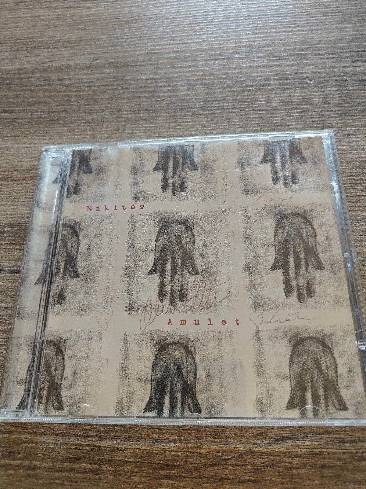 Nikotov - Amulet CD, Inclusief boekje, Pop, Ophalen of Verzenden, Zo goed als nieuw