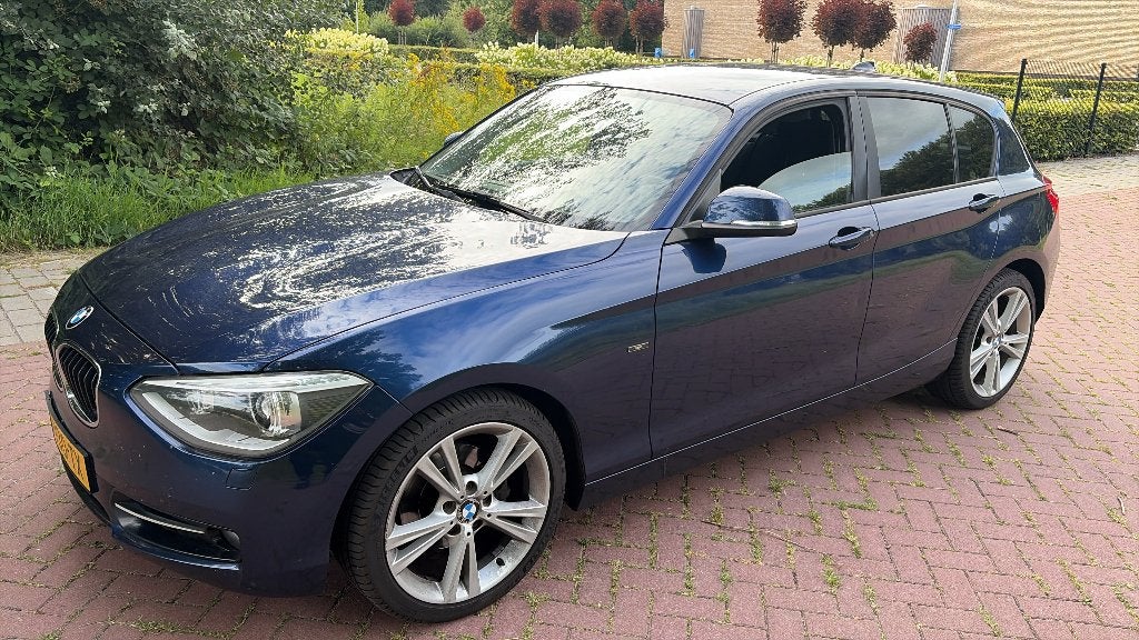 BMW F20 1-Serie 118i Sport /170pk / Navi/ Stoelverwrm/ 18", Auto's, BMW, 1-Serie, Euro 5, 4 cilinders, Blauw
