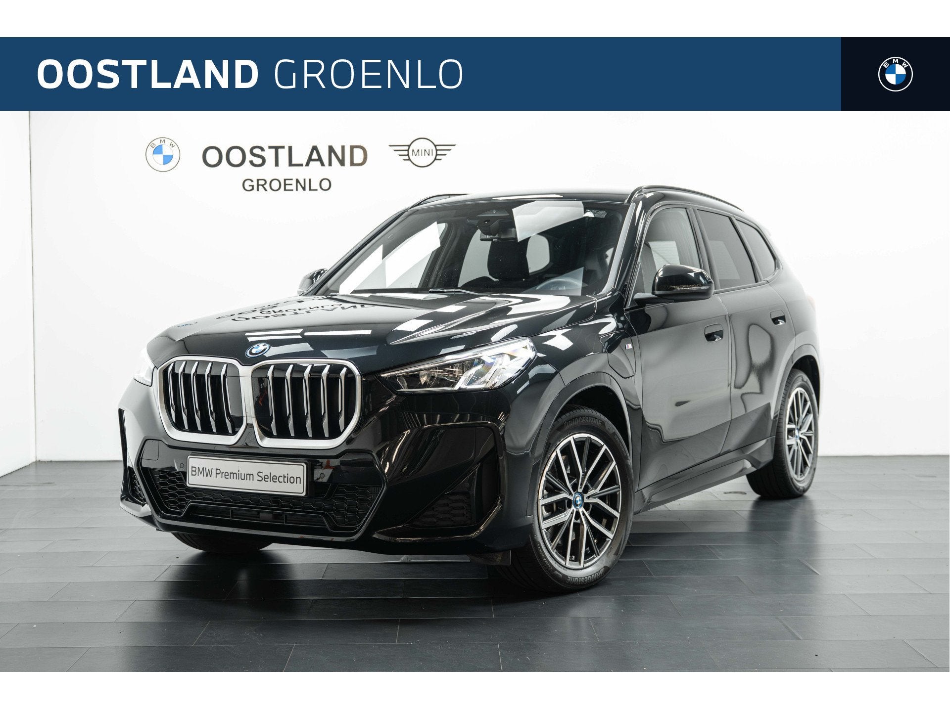 BMW X1 xDrive25e M Sport Automaat / Trekhaak / Sportstoelen, Auto's, Gebruikt, Zwart, Bedrijf, Hybride Elektrisch/Benzine