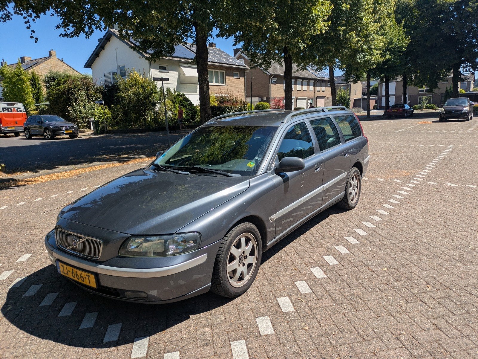 Volvo V70 2.5T automaat Titanium Grey, Zwart, Leder en Stof, 2521 cc, V70