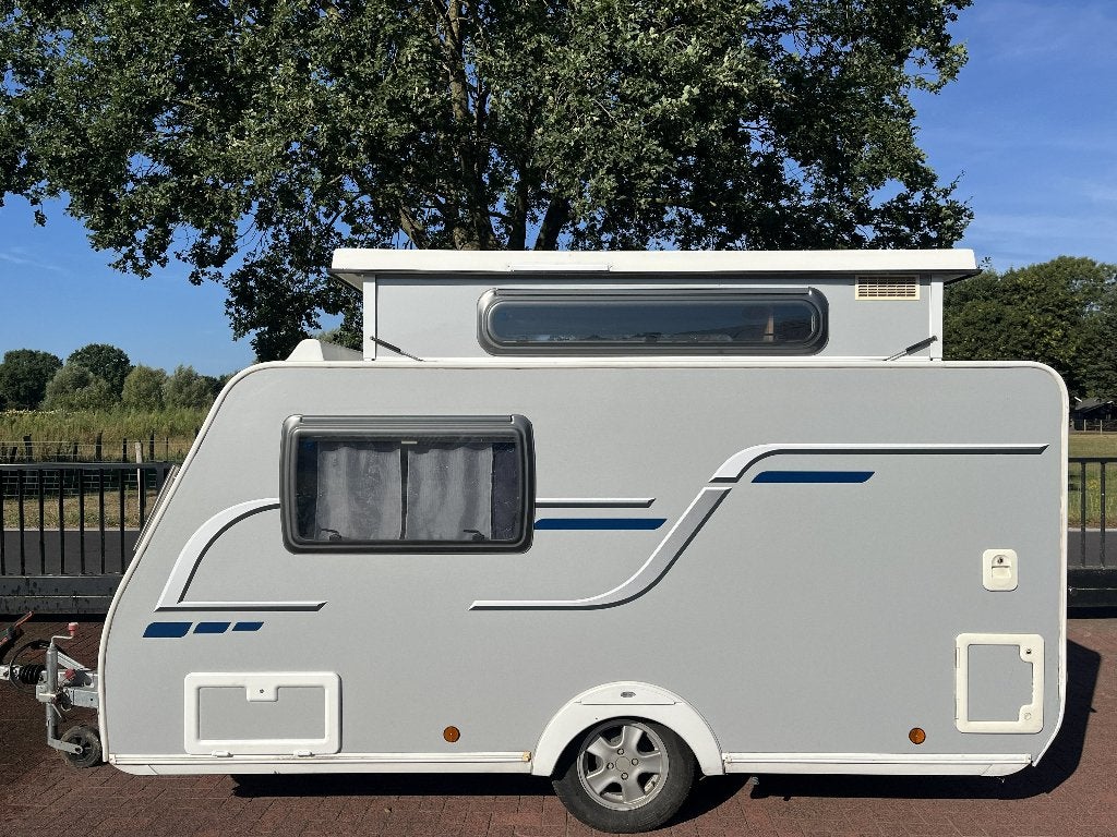 Mooie Trigano Silver 310 TLD hefdakcaravan bwjr 2015, Caravans en Kamperen, Caravans, Trigano, Tot en met 2, Schokbreker, Bedrijf