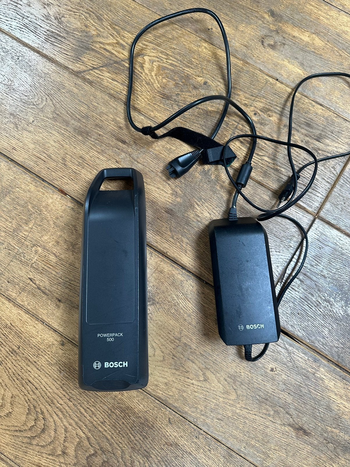 Bosch PowerPack 500 accu + originele Bosch 4A lader, Gebruikt
