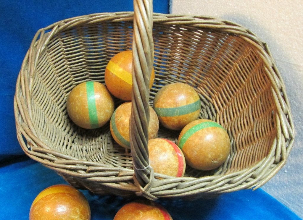 Oud houten balspel in mand., Ophalen