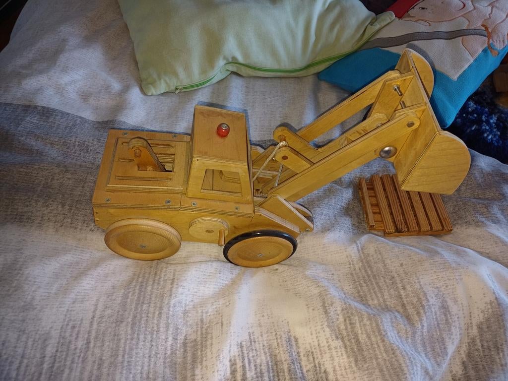 Graafmachine met pallets, Ophalen