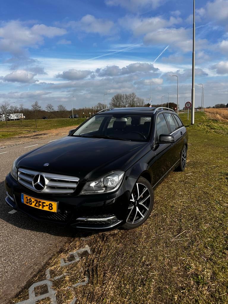 Mercedes-Benz C-Klasse C180cdi BE Estate Aut7 2012 Zwart, Auto's, Mercedes-Benz, Automaat, Achterwielaandrijving, 1800 kg, Zwart