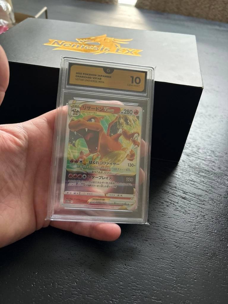 Charizard vstar grade 10, Ophalen of Verzenden, Zo goed als nieuw, Meerdere kaarten, Foil
