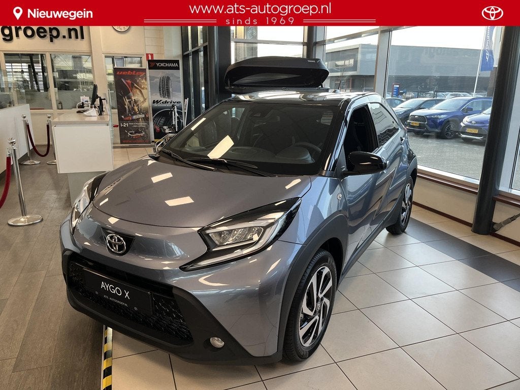 Toyota Aygo X 1.0 VVT-i MT Pulse Nieuw | Celestite Grey/zwar, Stof, Gebruikt, Euro 6, 4 stoelen