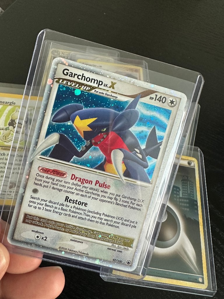 Pokemon Garchomp Lv.X Majestic Dawn, Ophalen of Verzenden, Zo goed als nieuw, Losse kaart, Foil