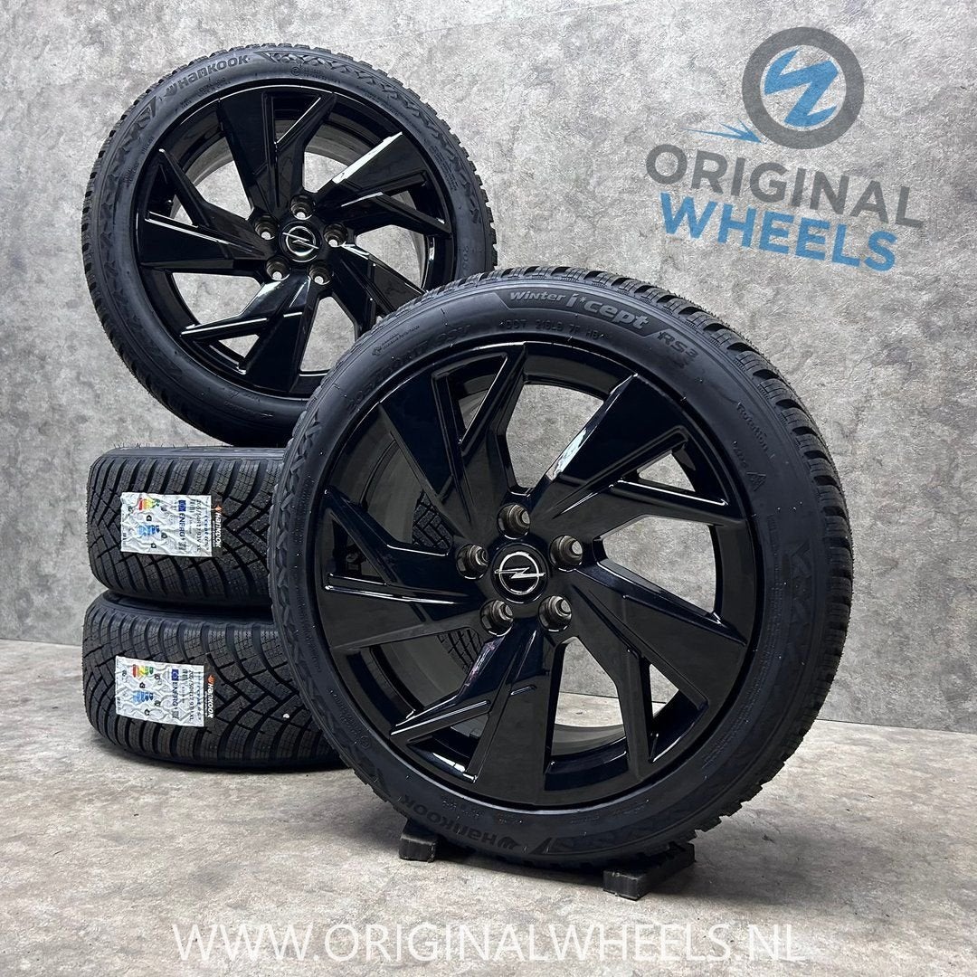 DIV. 17 inch originele velgen + winterbanden Opel Astra L
