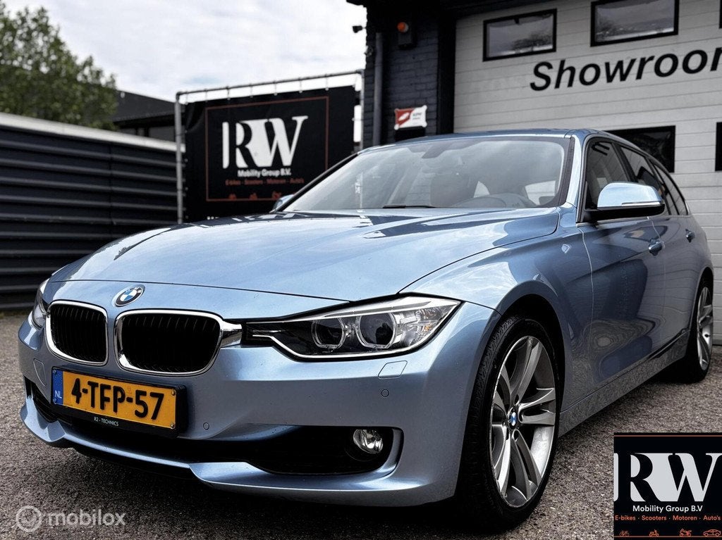 BMW 3-serie Touring 316i NAP*NAVI*CRUISE*AIRCO/CLIMA*PDC V/A, Gebruikt, Euro 6, 4 cilinders, Blauw