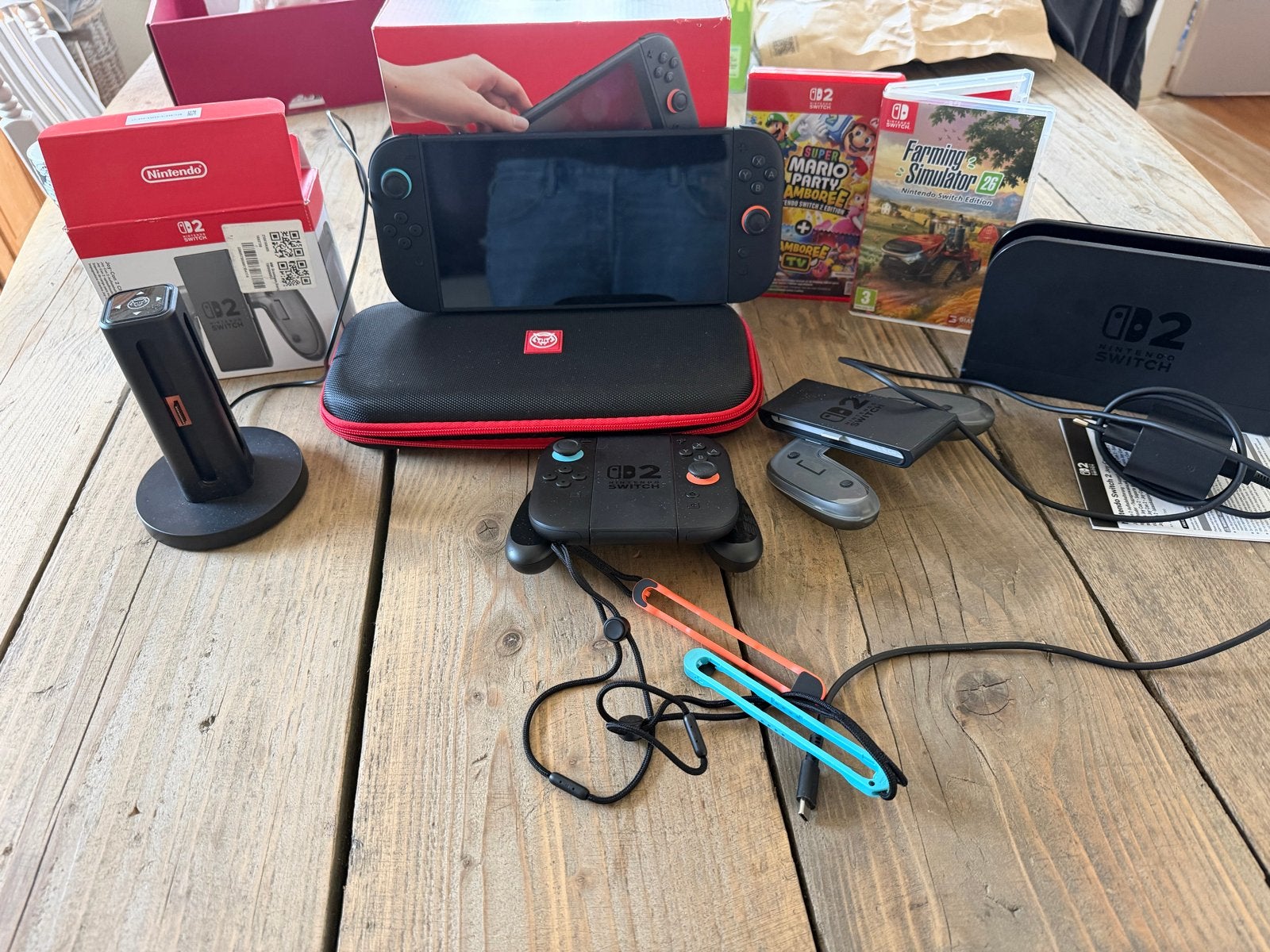 Nintendo Switch 2 met 4 controllers en games, Spelcomputers en Games, Met games, Ophalen of Verzenden, Zo goed als nieuw, Switch Original