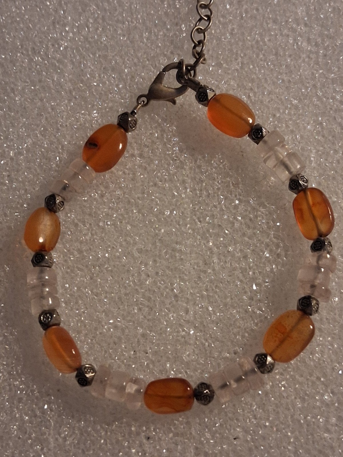 Armband Carneool/Rosekwarts met zilveren tussenkralen, Ophalen of Verzenden, Nieuw, Oranje, Overige materialen