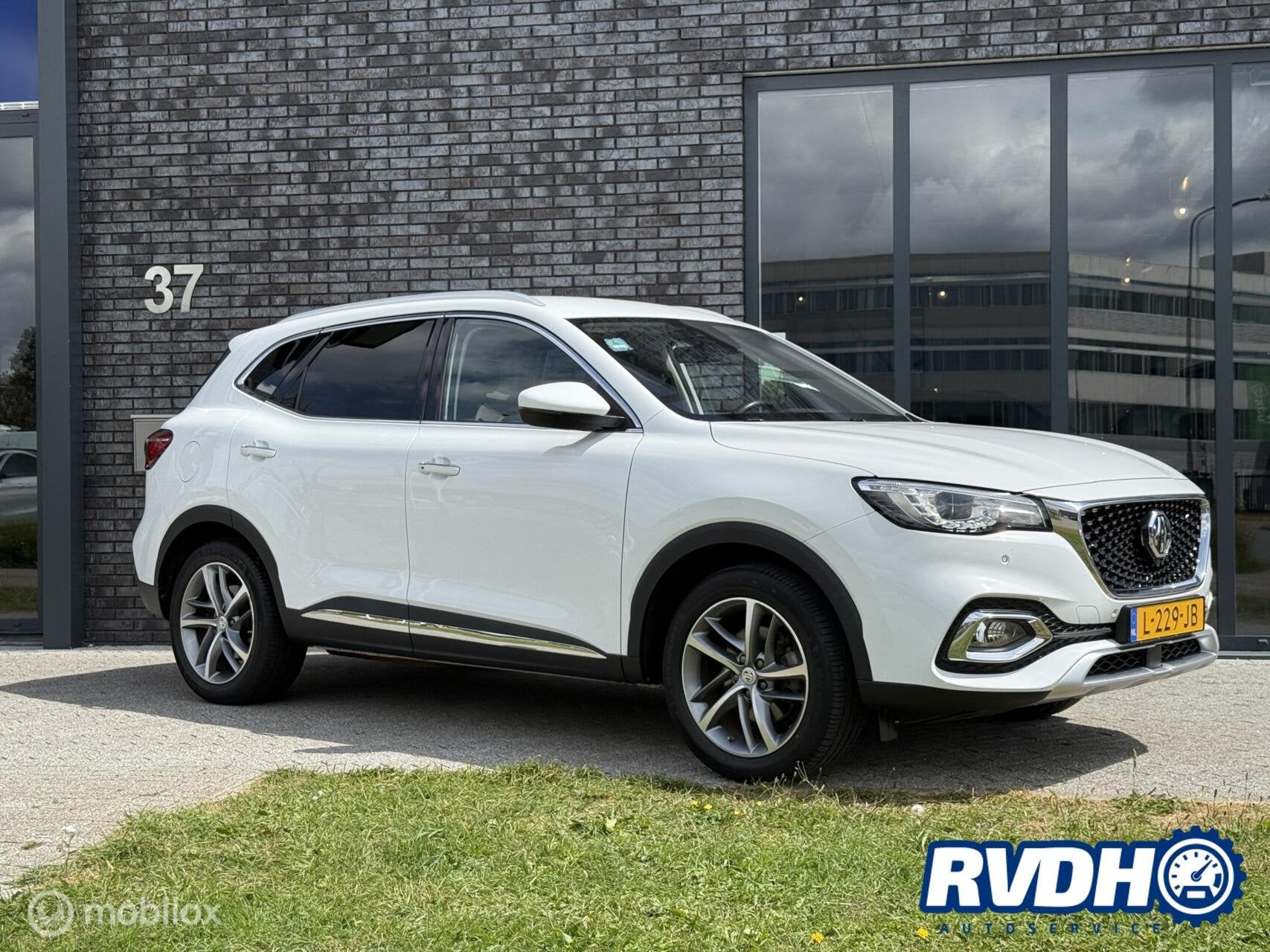MG EHS 1.5 TGDI Edition1 |Leder|TrekH|Camera|ACC, Auto's, Gebruikt, 258 pk, Automatische klimaatregeling, Wit