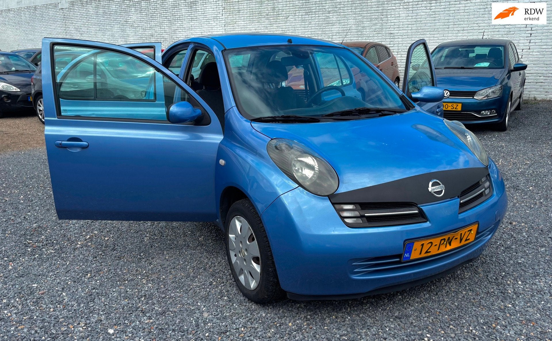Nissan Micra 1.2 Visia | Airco | Nieuwe APK, Voorwielaandrijving, Stof, 4 cilinders, Blauw