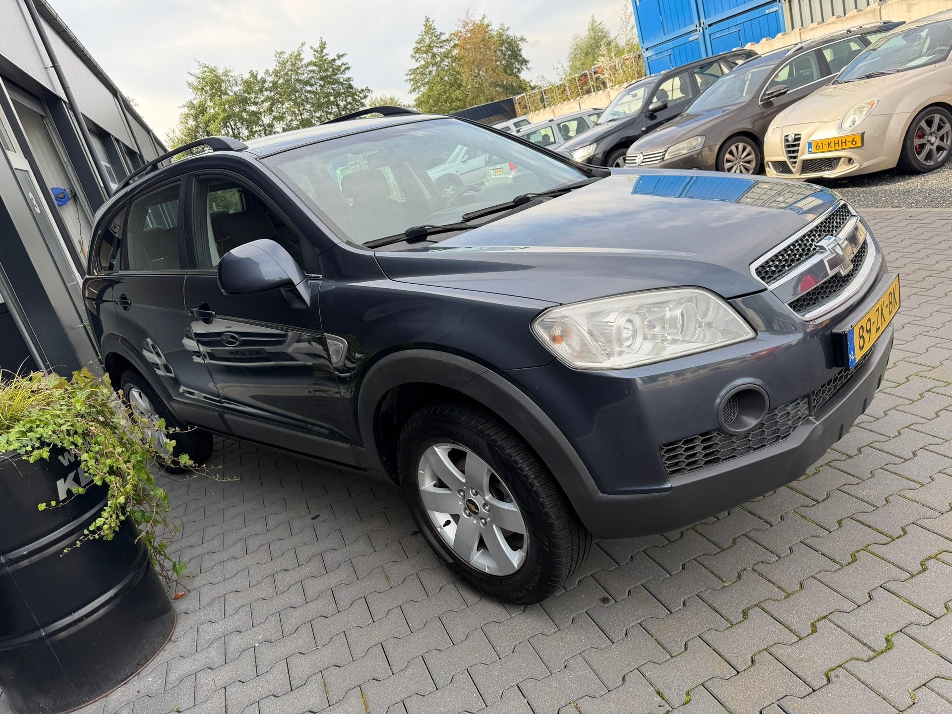Chevrolet Captiva 2.4i Style 2WD 7 pers, Auto's, Stof, Gebruikt, Zwart, Bedrijf