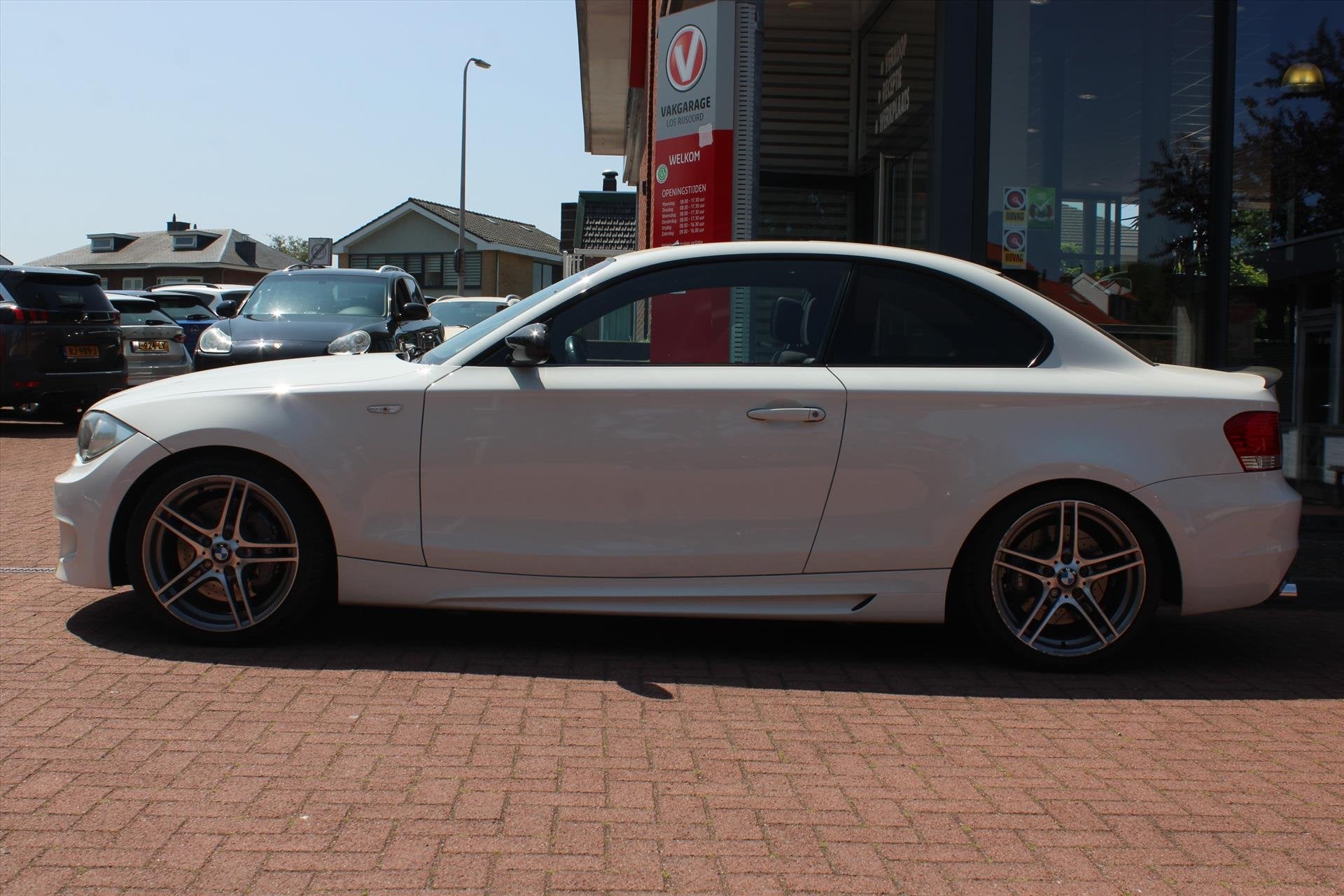 BMW 1-Serie (e87) 135i Coupé 306pk | Handbak | TOPPER ! | S, Auto's, BMW, 1-Serie, Gebruikt, Zwart, 4 stoelen