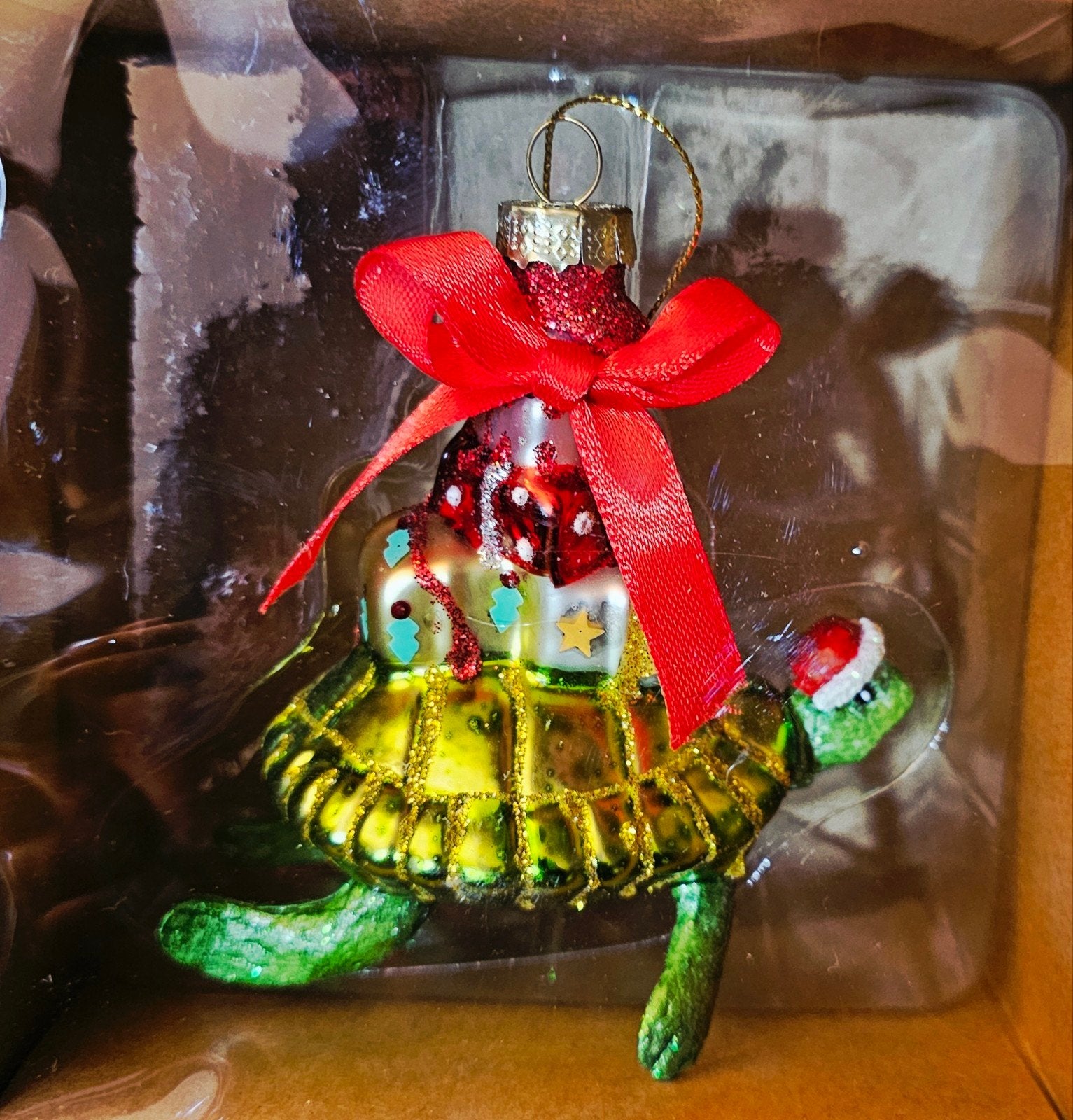 Kerstbal schilpad, Ophalen
