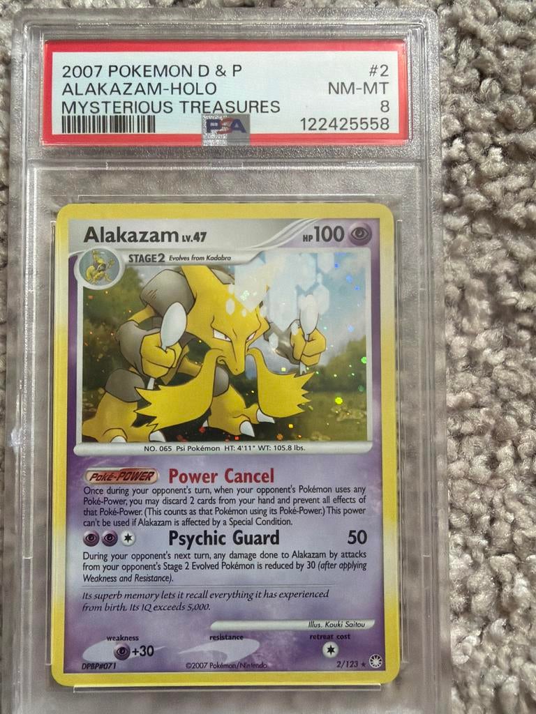 Alakazam Holo PSA 8 - Mysterious Treasures Pokémon Kaart, Ophalen of Verzenden, Zo goed als nieuw, Losse kaart, Foil