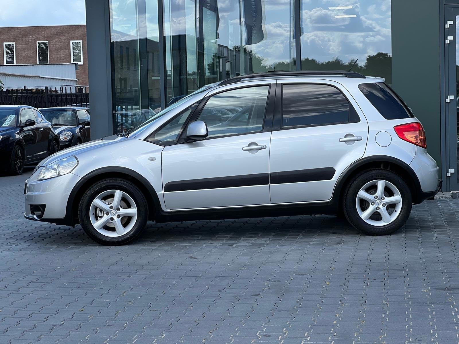 Suzuki SX4 1.6 SHOGUN AIRCO LMV TOP-AUTO, Auto's, Suzuki, Gebruikt, 4 cilinders, 49 €/maand, Origineel Nederlands