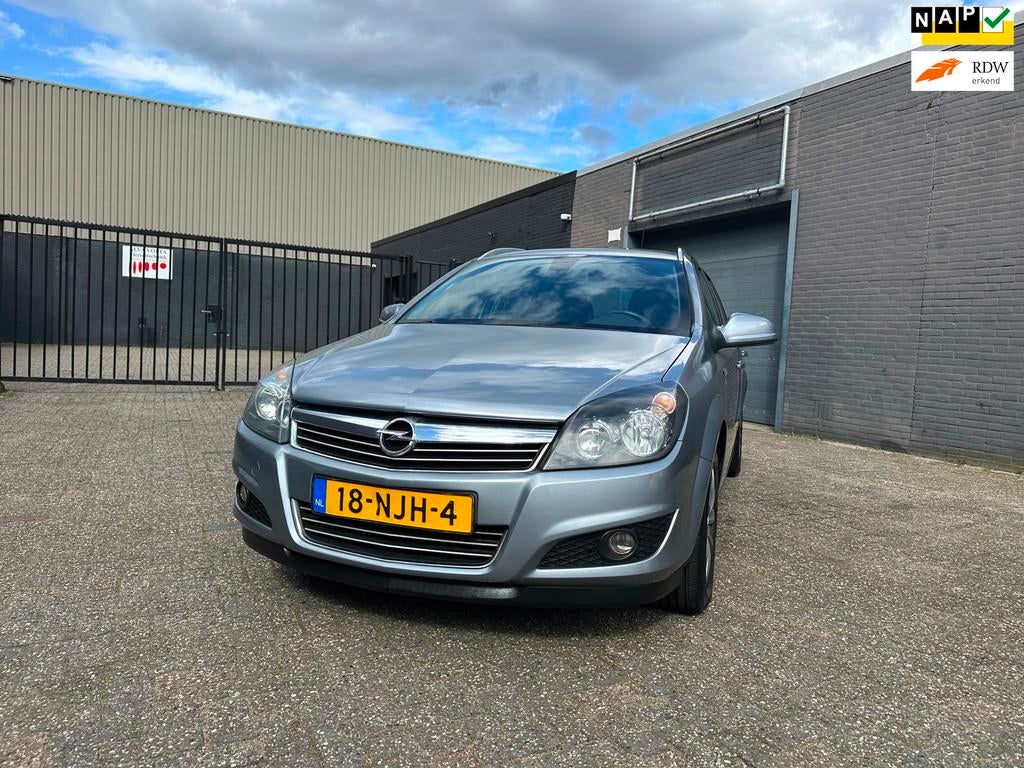 Opel Astra Wagon 1.6 111 years Edition Airco Cruise Navi PDC, Voorwielaandrijving, Euro 5, Stof, Gebruikt