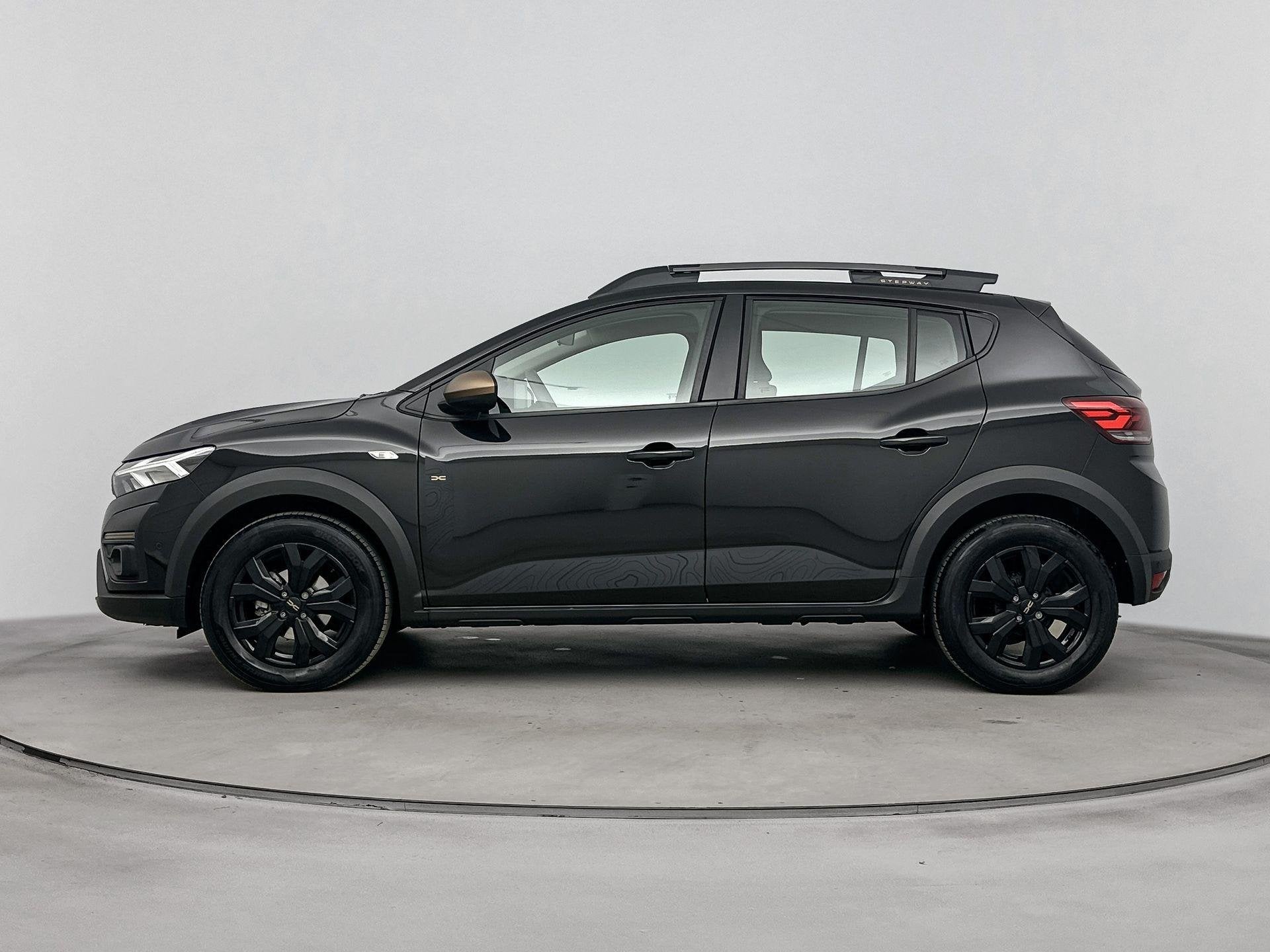 Dacia Sandero Stepway 1.0 TCe Extreme 110PK | Pack Extreme |, Auto's, Stof, Gebruikt, Euro 6, Zwart