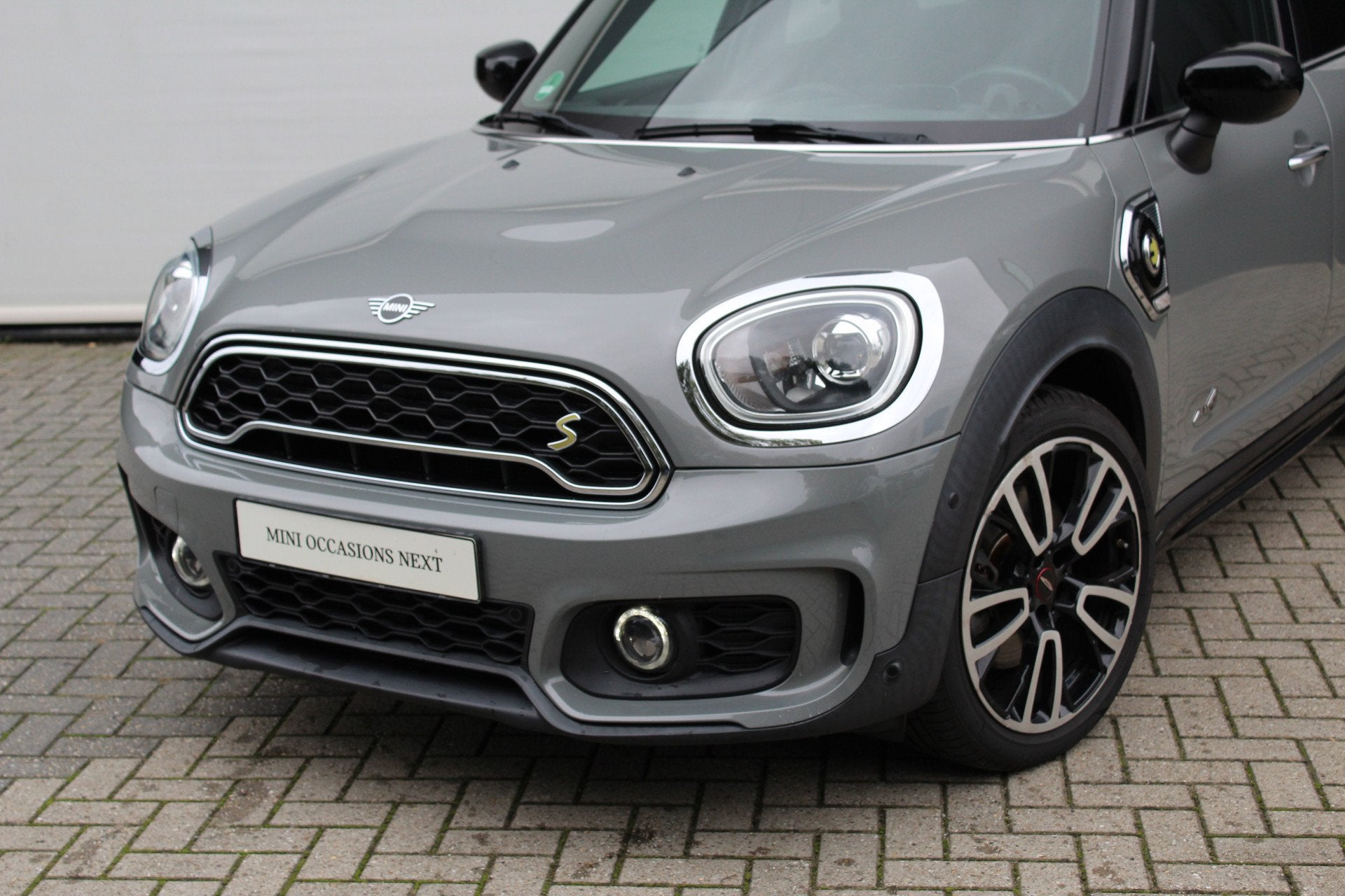 MINI Countryman Cooper S E ALL4 JCW Automaat / Panoramadak /, Auto's, Automaat, Dealer onderhouden, Gebruikt, Met garantie (alle)
