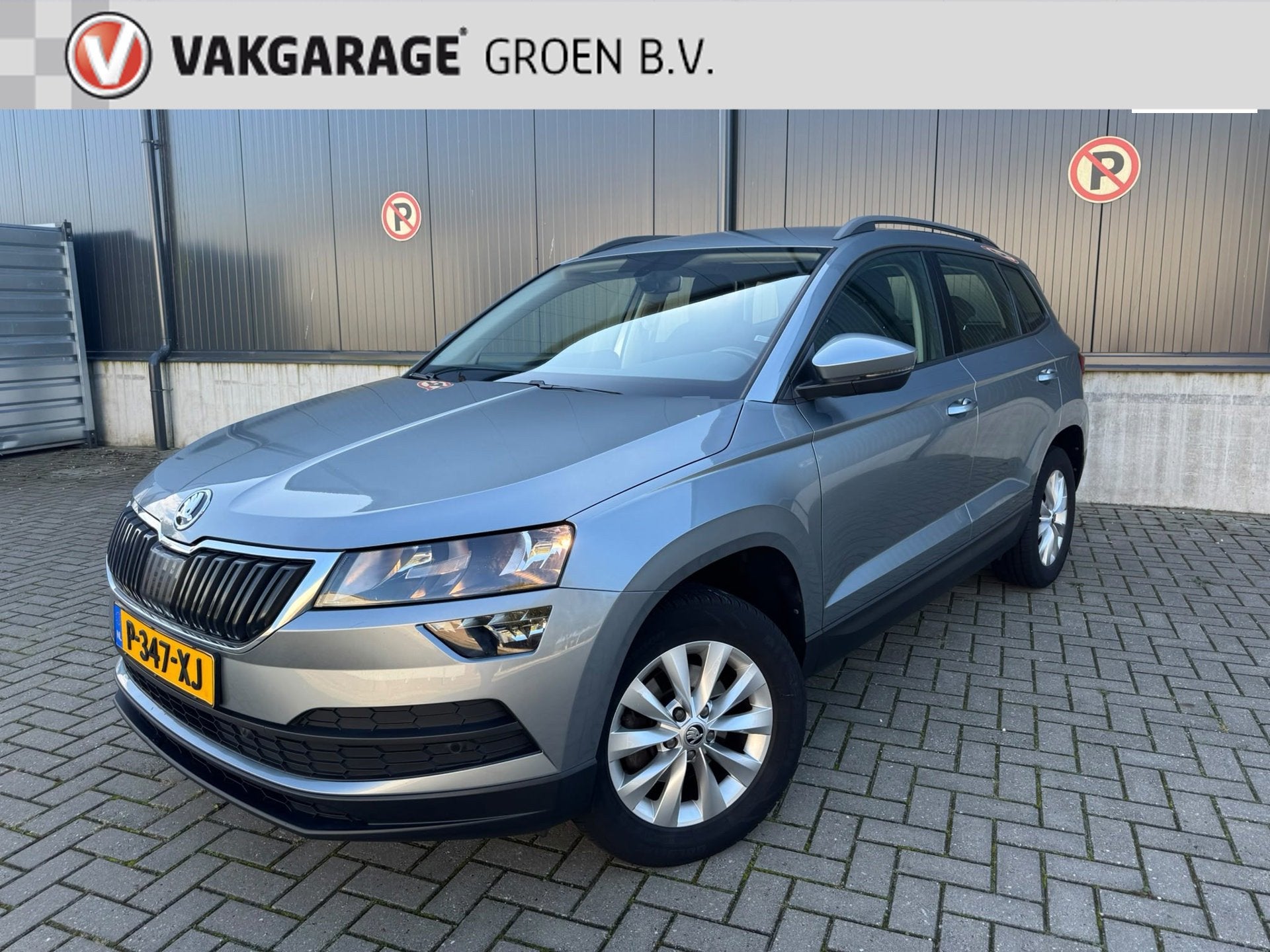 Skoda Karoq 1.0 TSI Style / clima / cruise / navi / camera /, Auto's, Voorwielaandrijving, Stof, Gebruikt, Verwarmde buitenspiegels