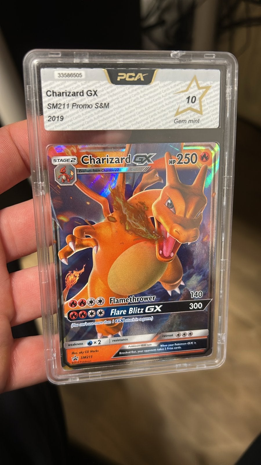 Charizard GX SM211 Promo S&M 2019 PCA 10 Gem Mint, Ophalen of Verzenden, Nieuw, Losse kaart, Foil