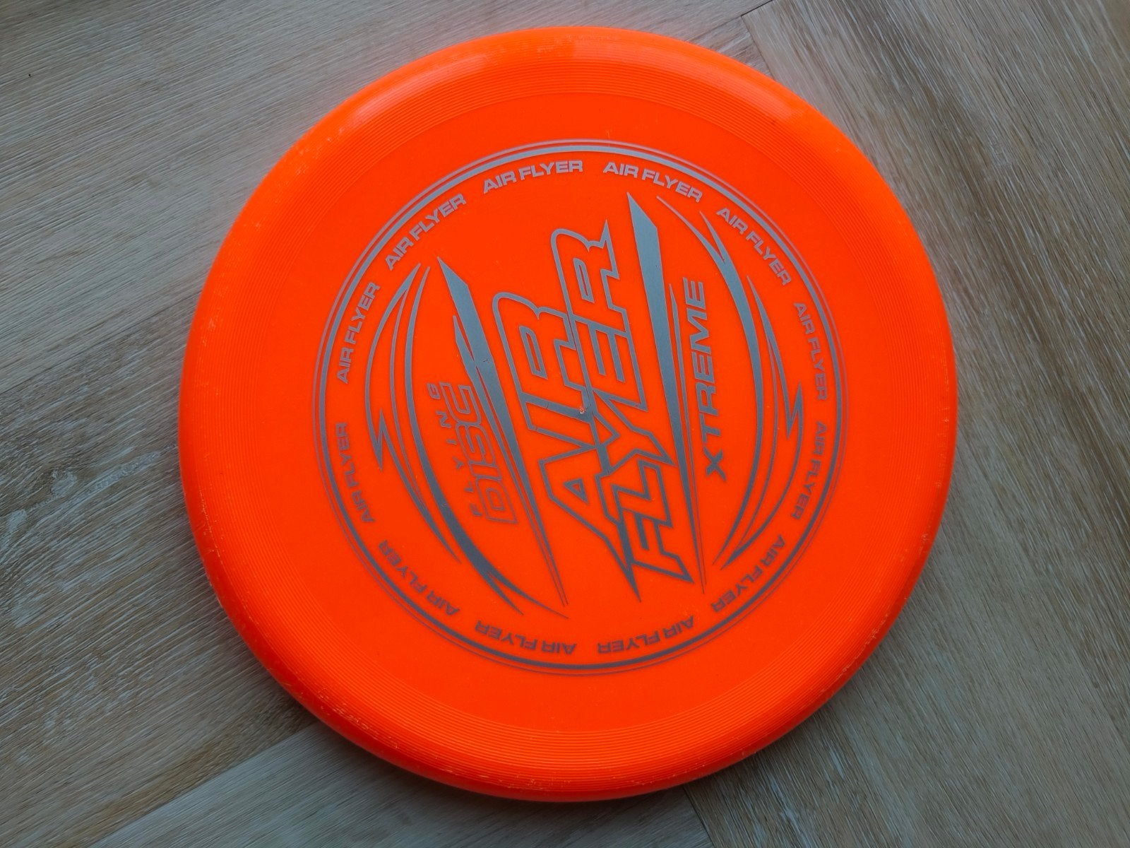Oranje Air Flyer Xtreme Frisbee, Ophalen, Gebruikt