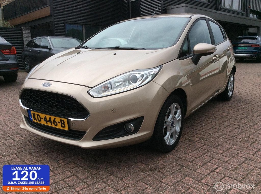 Ford Fiesta 1.0 Style Ultimate Lm Vlg Nav Nap 5-deurs Dealer, Auto's, Ford, Voorwielaandrijving, Stof, Bruin, 23 km/l