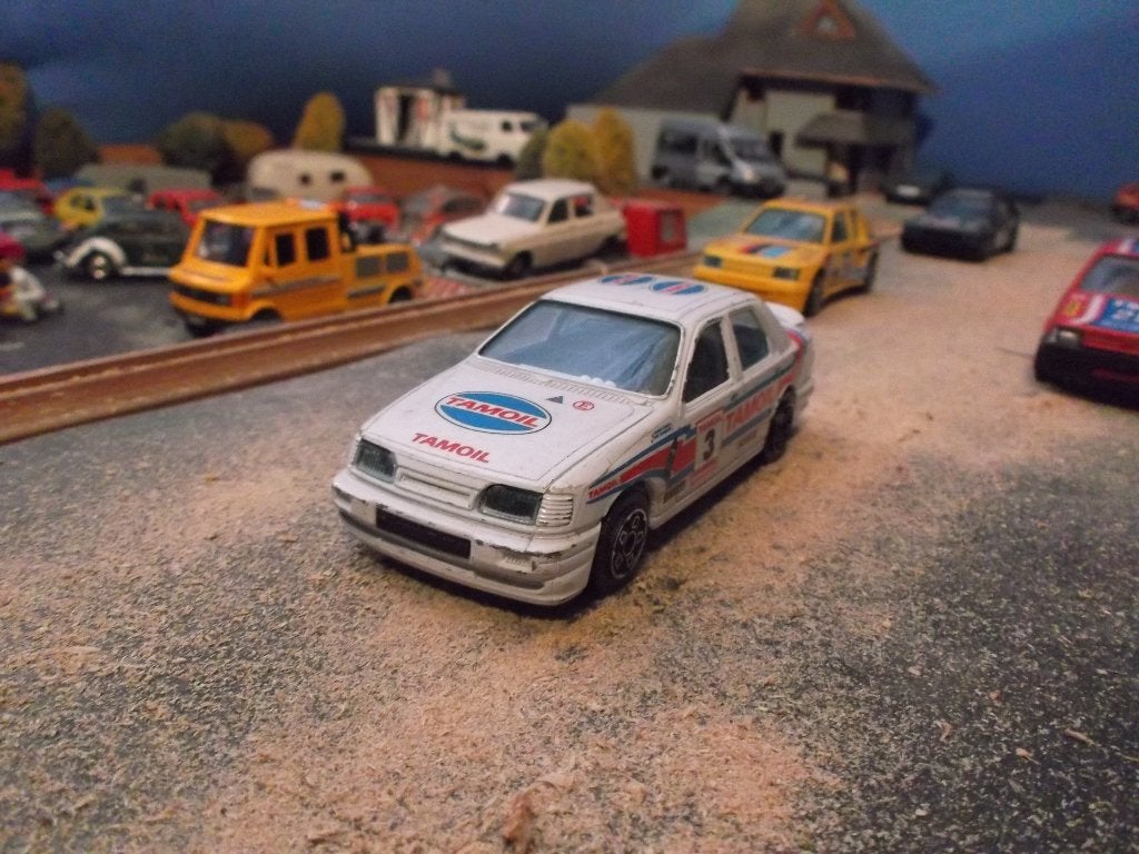 1:43 Sierra Cosworth Rally - Bburago Tamoil, Ophalen of Verzenden, Gebruikt, Auto, Overige merken