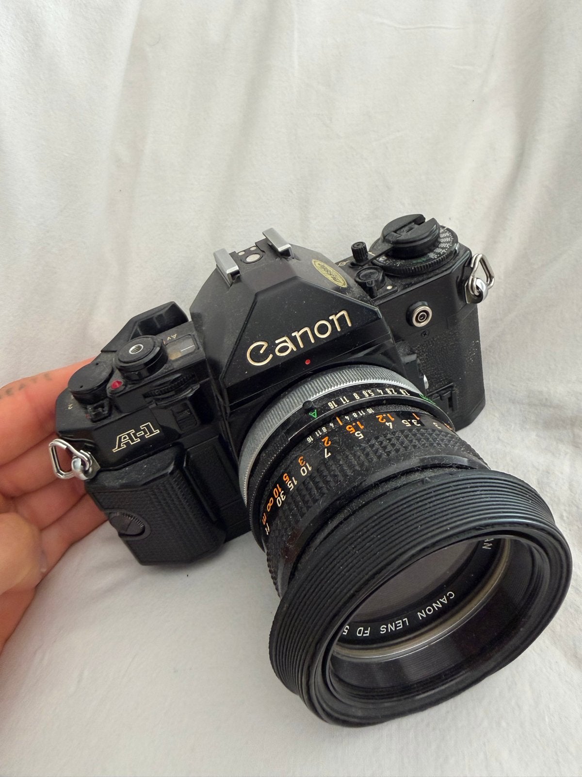 Canon A-1 met 50 mm lens - Werkt perfect!, Audio, Tv en Foto, Fotocamera's Analoog, Ophalen of Verzenden, Gebruikt, Spiegelreflex