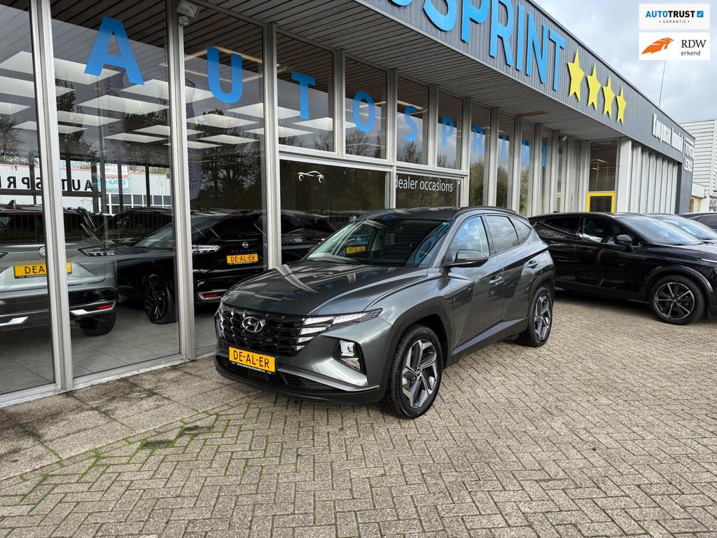 Hyundai Tucson 1.6 T-GDI PHEV Comfort 4WD 265PK / ACHTERUITR, Automaat, Stof, Zwart, 4 cilinders