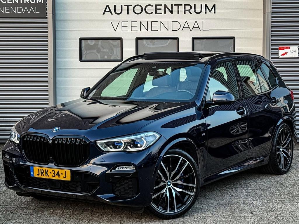BMW X5 45e XDrive45e High Executive 3X M-SPORT INDIVIDUAL PA, 394 pk, Blauw, Hybride Elektrisch/Benzine, 2998 cc