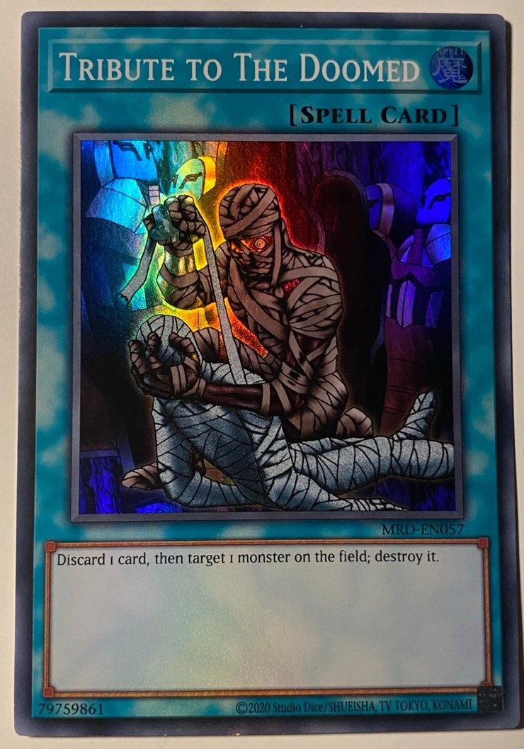 Yu-Gi-Oh! Tribute to the Doomed MRD Print !, Ophalen of Verzenden, Zo goed als nieuw, Losse kaart, Foil
