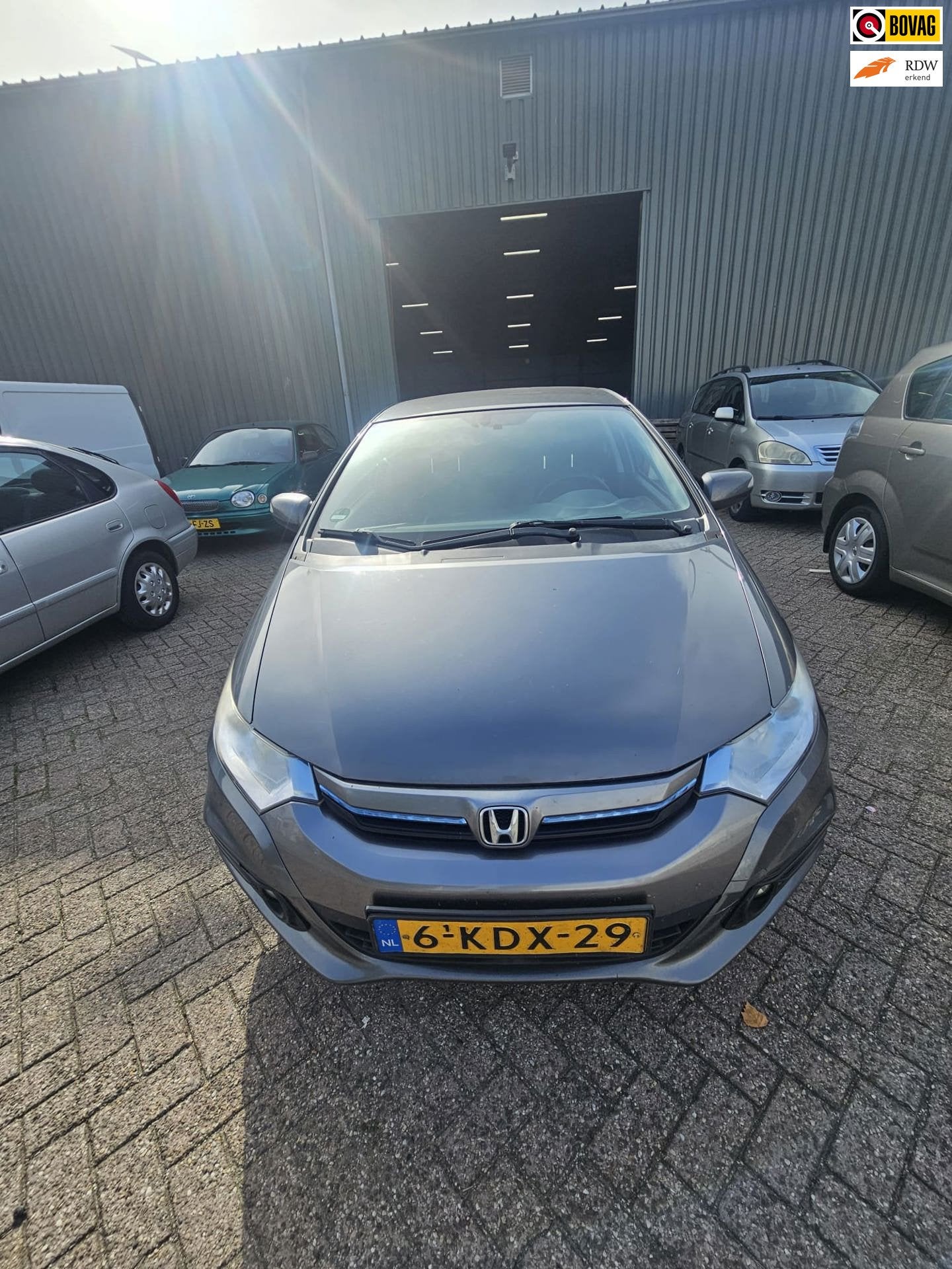 Honda Insight 1.3 Exclusive, Auto's, Euro 5, Gebruikt, 4 cilinders, Leder en Stof